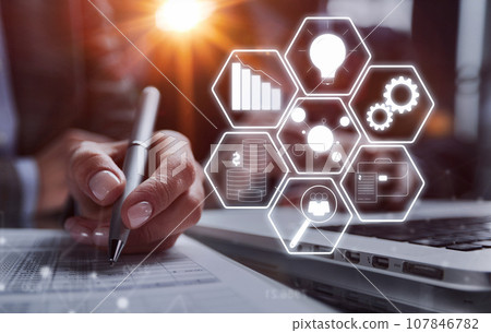 man looking through to documents. Business assessment and audit. 107846782