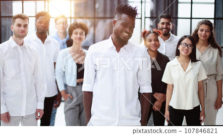 High Angle View Of Multiracial Friend Stacking Hand Together High Angle View Of Multiracial Friend Stacking Hand Together 107846821