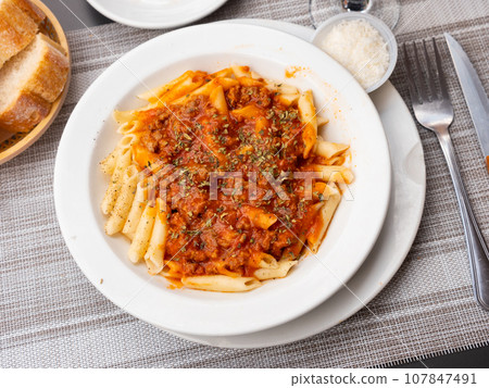 Classic italian pasta in tomato sauce 107847491