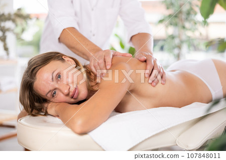Femail having massage Femail having massage 107848011