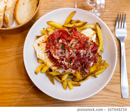 fried eggs with essential bacon fried eggs with essential bacon 107848250