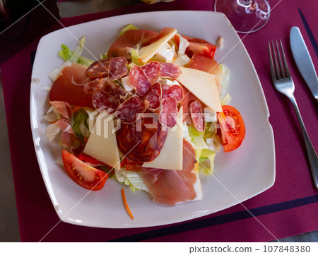 Ensalada catalana is a popular salad of Spanish cuisine 107848380