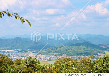 View from the top of the mountain, calm autumn day, city area View from the top of the mountain, calm autumn day, city area 107849766