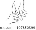 Child's hand holding adult's finger, monochrome 107850399