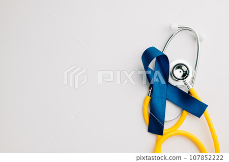 November and September bring attention to men's health with an awareness blue ribbon and a stethoscope. Regular check-ups, prevention, and support are critical for adult well-being. November and September bring attention to men's health with an awareness blue ribbon and a stethoscope. Regular check-ups, prevention, and support are critical for adult well-being. 107852222