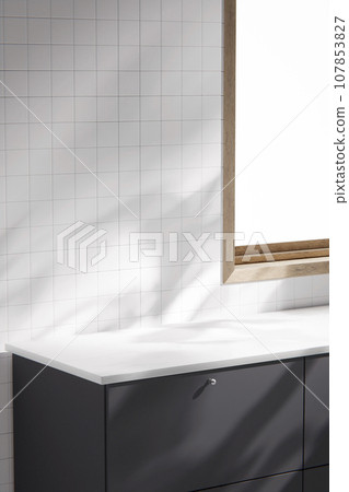 Kitchen, bathroom, white tile, sink, window frame with  sunlight coming in. 107853827