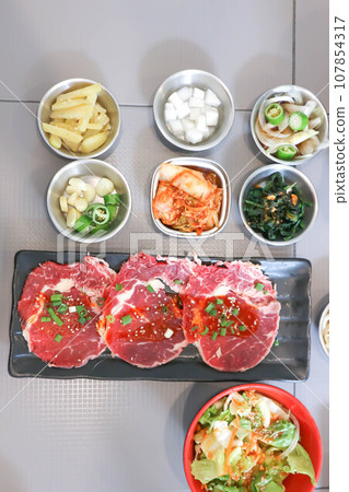 raw beef , sliced beef or beef for cook and Korean salad 107854317