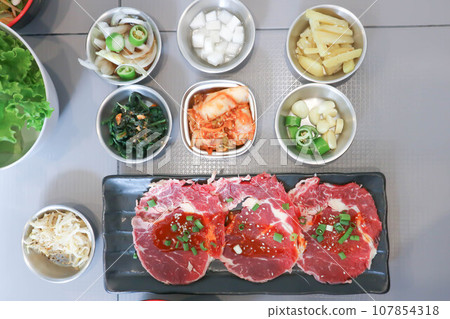 raw beef , sliced beef or beef for cook and Korean salad 107854318