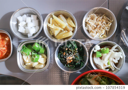 sprout salad , Korean salad and Kimchi or sewweed salad or Korean food 107854319