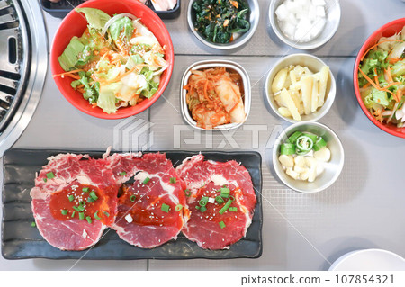 raw beef , sliced beef or beef for cook and Korean salad 107854321