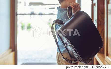 Elementary school student commuting to and from school Elementary school student commuting to and from school 107855778