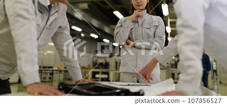People working in the factory People working in the factory 107856527