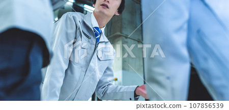 People working in the factory 107856539