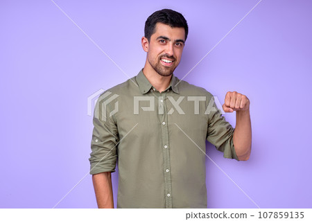 Young deaf mute man saying girlfriend using sign language on blue background Young deaf mute man saying girlfriend using sign language on blue background 107859135