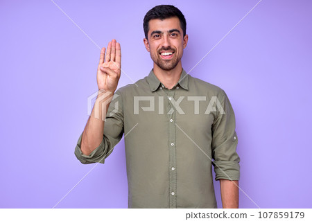 happy deaf handsome man demonstrating hello hi gesture happy deaf handsome man demonstrating hello hi gesture 107859179