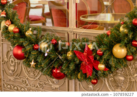 Find keywords for the theme Christmas tree garland on the cafe door Find keywords for the theme Christmas tree garland on the cafe door 107859227