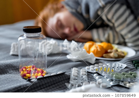 died ginger girl lying on bed 107859649