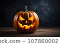 Jack o lantern on a wooden table with dark background. Photorealistic Spooky orange pumpkin for halloween on a dark background 107860002