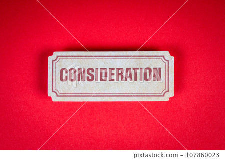Consideration Concept. Paper sticker with text on a red background Consideration Concept. Paper sticker with text on a red background 107860023