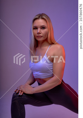 blonde athlete girl prepares for race 107860476