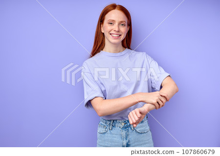 awesome happy girl touching her arm, keeping it awesome happy girl touching her arm, keeping it 107860679