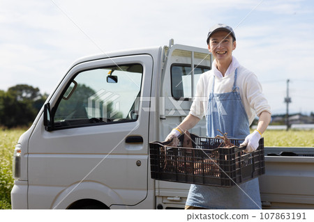 A man delivering vegetables A man delivering vegetables 107863191