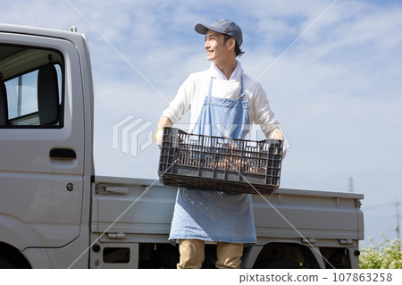 A man delivering vegetables A man delivering vegetables 107863258