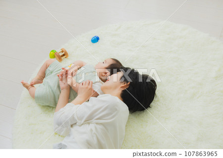 Family in the living room baby Family in the living room baby 107863965