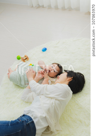 Family in the living room baby 107863970