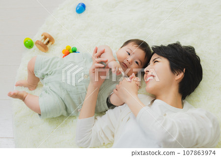 Family in the living room baby 107863974