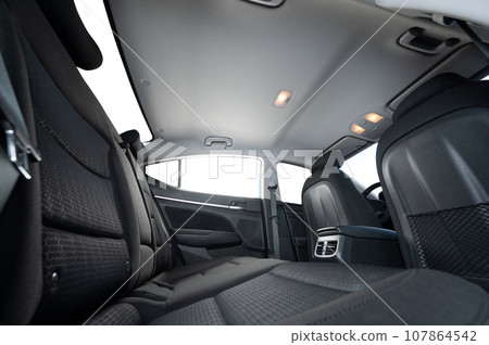 Clean rear passenger car seat 107864542