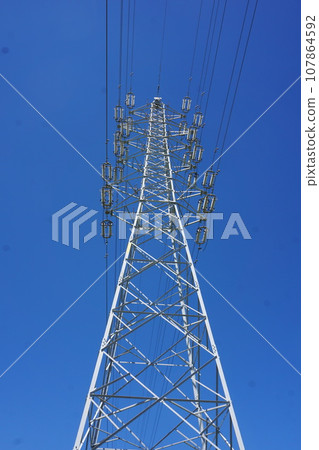 Blue sky and transmission tower Blue sky and transmission tower 107864592