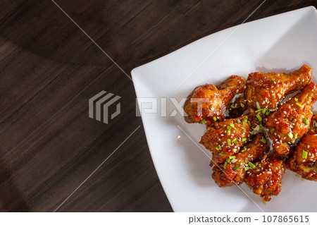 Korean BBQ chicken. The classic Korean dish. Street food on Korean. 107865615