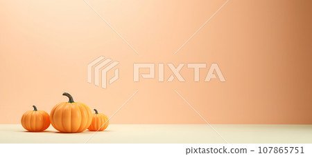 Thanksgiving holiday pumpkin arrangement against an beige colored background Thanksgiving holiday pumpkin arrangement against an beige colored background 107865751