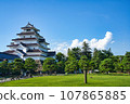 Aizuwakamatsu Castle surrounded by fresh green trees 107865885