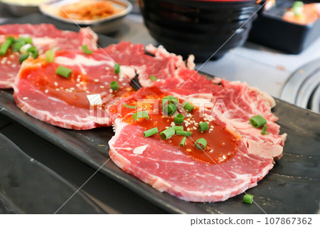 raw beef , sliced beef or beef for cook and Korean salad raw beef , sliced beef or beef for cook and Korean salad 107867362