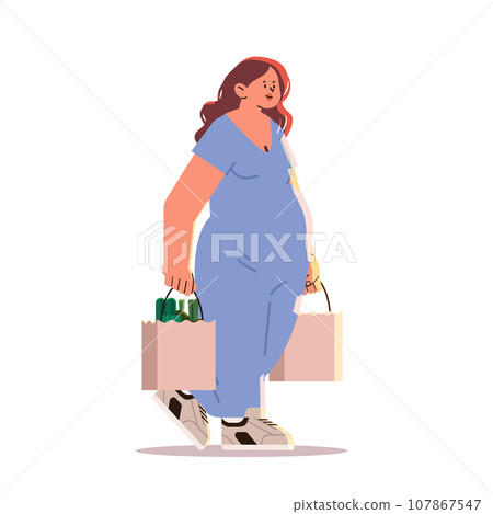 happy pregnant woman future mom carrying fresh vegetables in paper bags pregnancy motherhood expectation concept 107867547