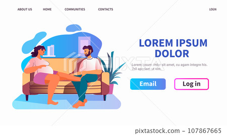 happy pregnant woman future mom with her partner sitting together on sofa pregnancy motherhood expectation concept 107867665