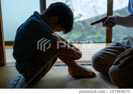 child doing physical education sitting child doing physical education sitting 107869070