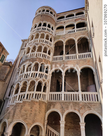 Scala Contarini del Bovolo or Palazzo Contarini del Bovolo in Venice. The Palazzo Contarini del Bovolo is a small palazzo known with spiral staircases. Venice, Italy. Scala Contarini del Bovolo or Palazzo Contarini del Bovolo in Venice. The Palazzo Contarini del Bovolo is a small palazzo known with spiral staircases. Venice, Italy. 107869270