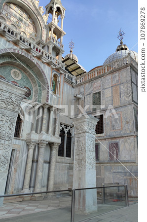 Facade of St Mark's Basilica, cathedral church of Venice, Italy. 107869278