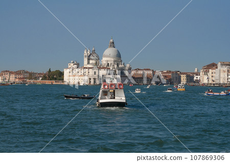 The Church of Santissimo Redentore, or Holy Redeemer, seen from Giudecca Canal at Venice The Church of Santissimo Redentore, or Holy Redeemer, seen from Giudecca Canal at Venice 107869306