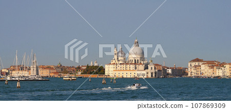 The Church of Santissimo Redentore, or Holy Redeemer, seen from Giudecca Canal at Venice The Church of Santissimo Redentore, or Holy Redeemer, seen from Giudecca Canal at Venice 107869309