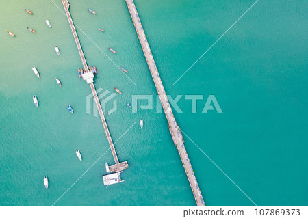 Aerial view of 2 bridges with boats anchored at Chalong Pier Aerial view of 2 bridges with boats anchored at Chalong Pier 107869373
