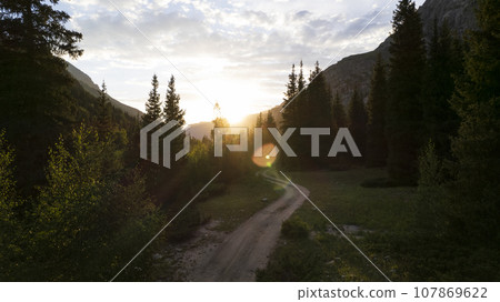 Beautiful sunset with a view of the green gorge Beautiful sunset with a view of the green gorge 107869622