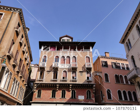 Facades of historic buildings in the city center. 107870131