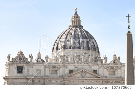 Fragment of Basilica of St. Peter in the Vatican and column on Saint Peters square in Vatican 107870663