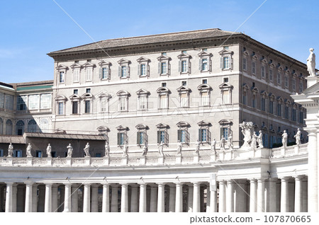 Fragment of Basilica of St. Peter in the Vatican and column on Saint Peters square in Vatican 107870665