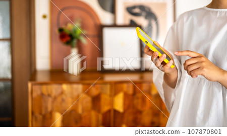 Woman with smartphone Woman with smartphone 107870801