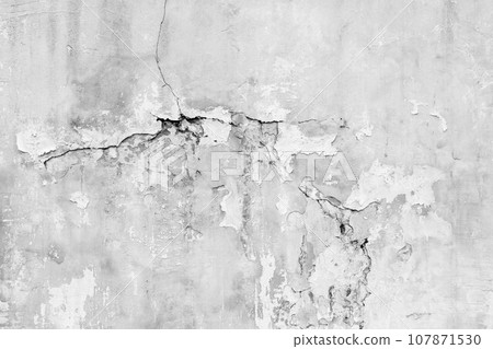Old wall with deep cracks. Grunge gray color texture. Destruction on the surface of the wall. 107871530